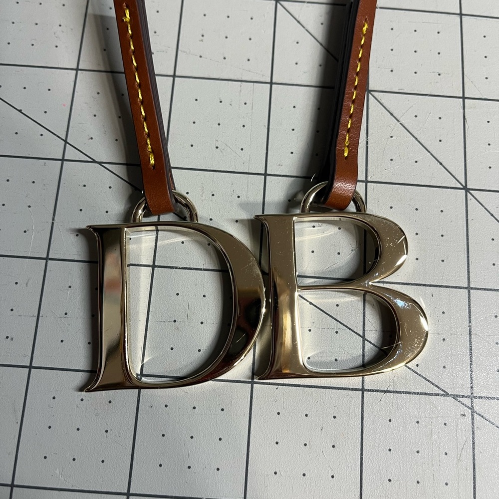 Dooney and Bourke hang tag